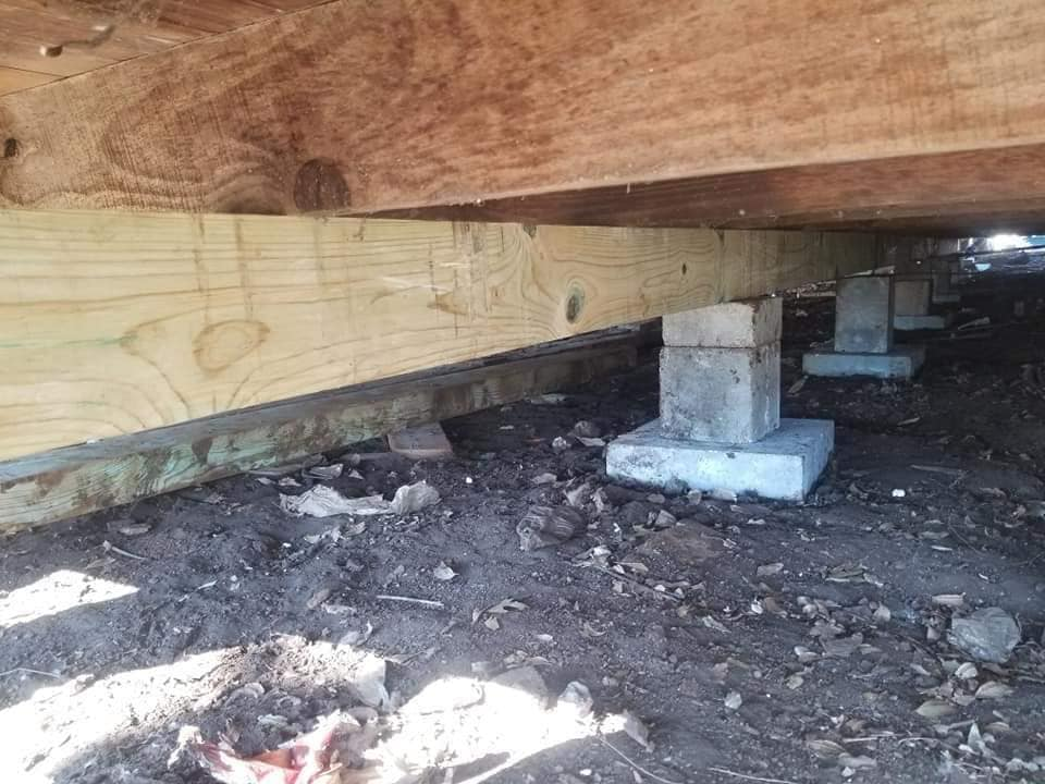 Pier and beam foundation support structure under a home